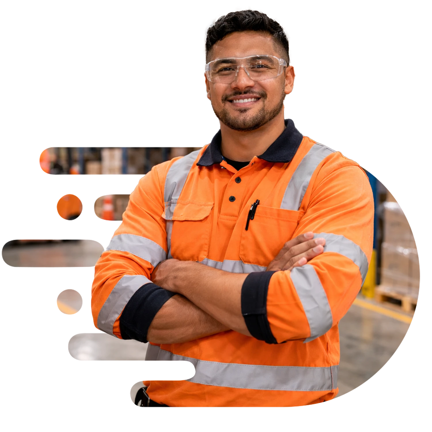 A smiling industrial worker wearing high-vis clothing and safety glasses standing cross armed.